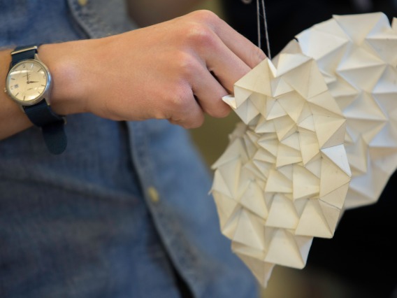 Geometric shape folded from paper